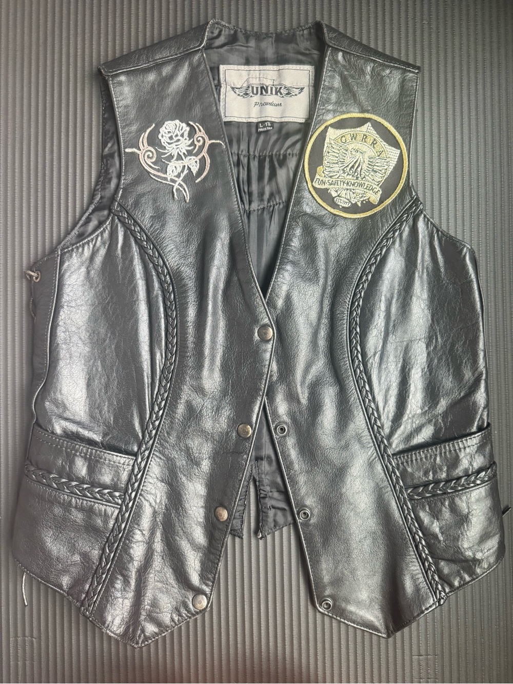 Unik Black Leather Jacket with White Embroidered Logo